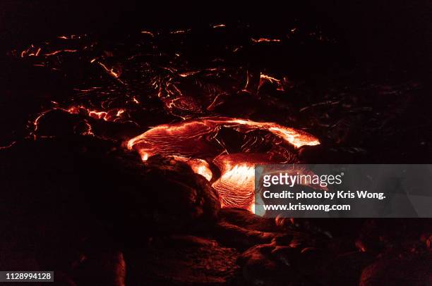 lava flow at night - kalapana stock pictures, royalty-free photos & images