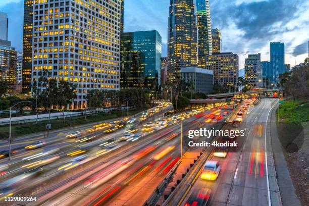los angeles downtown evening traffic - traffic stock pictures, royalty-free photos & images