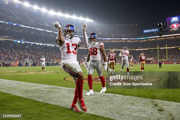 New York Giants wide receiver Odell Beckham celebrates with a dance after scoring a touchdown during the NFL game between the New York Giants and the...