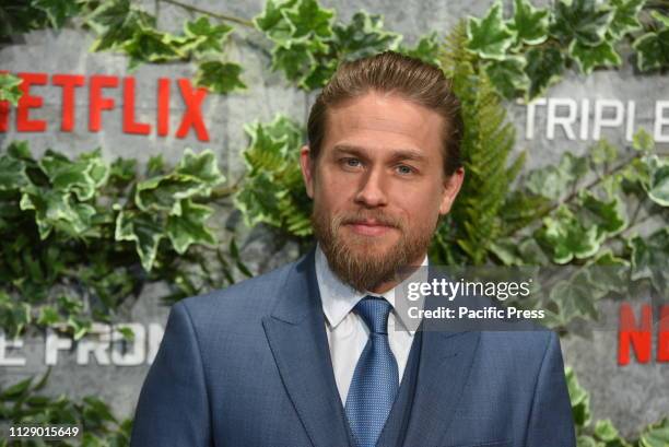 British actor Charlie Hunnam poses as he arrives for the premiere of 'Triple Frontier' at Callao Cinema in Madrid.