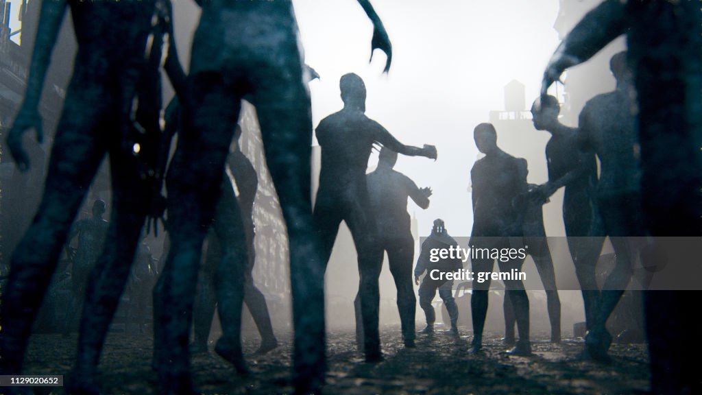 Zombie apocalypse survivor against hordes of undead