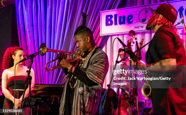 American bandleader, composer, and trumpet player Christian Scott plays trumpet with his septet at the Blue Note, New York, New York, February 5,...