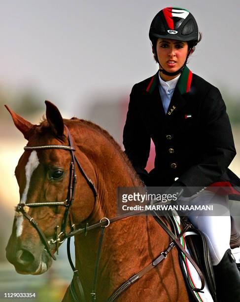 Sheikha Latifa al-Maktoum from the United Arab Emirates rides horse Kalaska De Semilly during the equestrian jumping individual qualifier, 10...