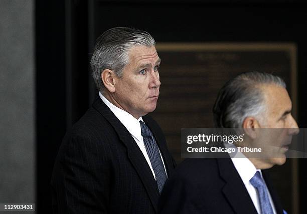 Christopher Kelly, left, an adviser and campaign fundraiser for Gov. Rod Blagojevich and his attorney Michael Monico arrive at the Dirksen U.S....