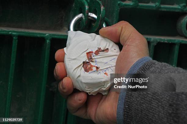 Man holds the lock of central office of Jamaat-e-Islami which was sealed by government in Srinagar,Kashmir on March 07, 2019.More than 300 leaders...