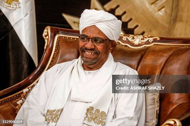 Sudanese President Omar al-Bashir chairs a meeting of leaders of some political parties in the capital Khartoum on March 7, 2019. - The meeting...