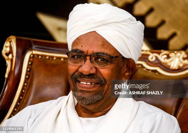Sudanese President Omar al-Bashir chairs a meeting of leaders of some political parties in the capital Khartoum on March 7, 2019. - The meeting...