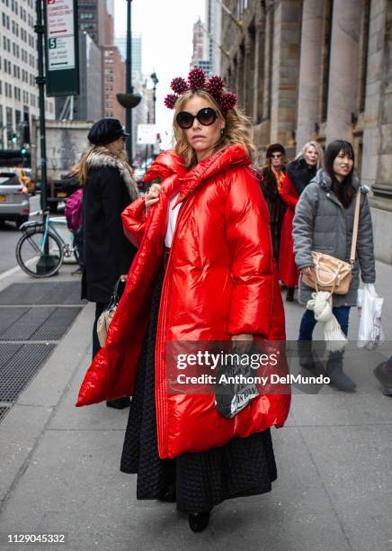 Street style of guest attending Dennis Basso fall 2019 runway show during New York Fashion Week held at Cipriani located at 110 E 42nd Street in New...