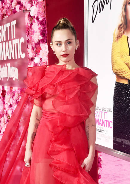 Miley Cyrus attends the premiere of Warner Bros. Pictures' "Isn't It Romantic" at The Theatre at Ace Hotel on February 11, 2019 in Los Angeles,...