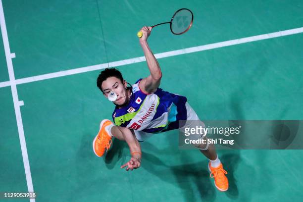 Kento Momota of Japan competes in the Men's Singles second round match against Kantaphon Wangcharoen of Thailand on day two of the Yonex All England...