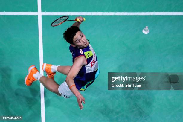 Kento Momota of Japan competes in the Men's Singles second round match against Kantaphon Wangcharoen of Thailand on day two of the Yonex All England...