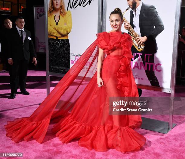 Miley Cyrus arrives at the Premiere Of Warner Bros. Pictures' "Isn't It Romantic" at The Theatre at Ace Hotel on February 11, 2019 in Los Angeles,...