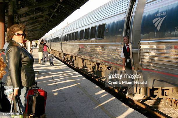 Passengers wait to board the Silver Star Amtrak in Tampa, Florida.