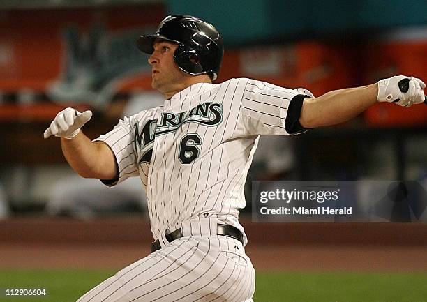 Florida Marlins Dan Uggla hits a 3-run homerun against the San Diego Padres at Dolphin Stadium in Miami, Florida, on Friday, May 2, 2008.