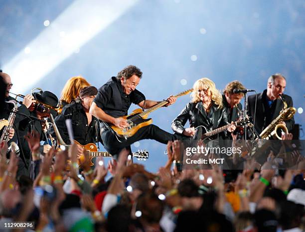 Bruce Springsteen and the E Street Band perform during halftime of Super Bowl XLIII at Raymond James Stadium in Tampa, Florida, Sunday, February 1,...