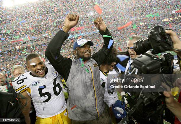Pittsburgh coach Mike Tomlin celebrates with LaMarr Woodley and Troy Polamalu as the Pittsburgh Steelers beat the Arizona Cardinals 27-23 in Super...