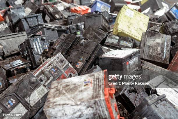 car batteries in vehicle battery recycling plant - car battery stock pictures, royalty-free photos & images