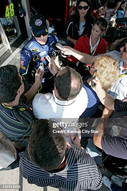 Driver Jimmie Johnson visits with the media before practice on Saturday, September 27 for the Camping World RV 400 on Sunday at Kansas Speedway in...