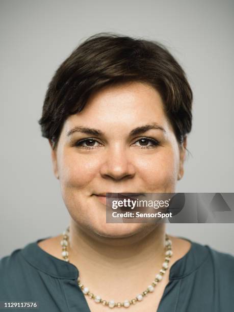 real caucasian adult woman with happy expression - short hair for fat women stock pictures, royalty-free photos & images