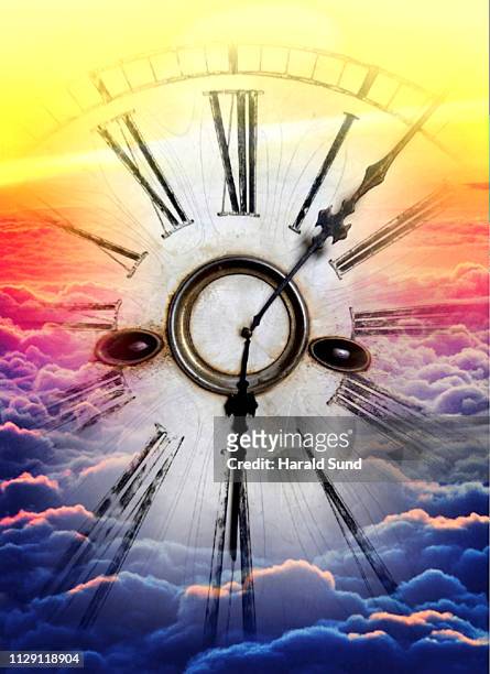 vintage antique grandfather clock face with roman numeral numbers and hour and second hands floating in a sea of sun lit clouds. - roman numeral 4 stock pictures, royalty-free photos & images