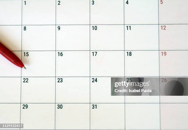pen over calendar. planning concept - calendario español fotografías e imágenes de stock