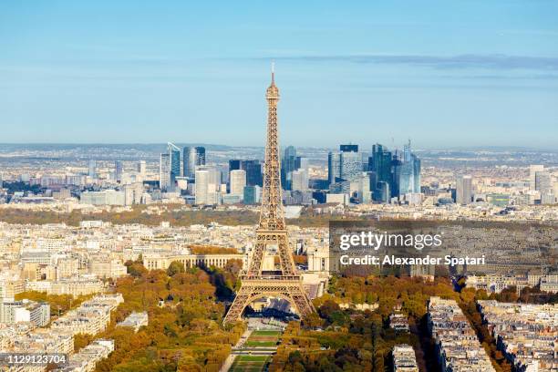 aerial view of paris cityscape with eiffel tower and la defense office buildings in the background, france - la tour eiffel stock pictures, royalty-free photos & images