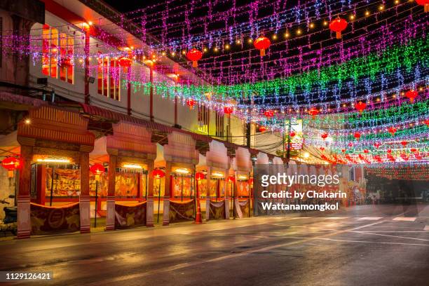 colors and lights of chanthaburi street during chinese new year. - chinese lantern festival stock-fotos und bilder