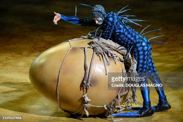An artist performs on stage in the Cirque du Soleil's touring circus production "Ovo" , at the Mineirinho Gymnasium, in Belo Horizonte, Brazil, on...