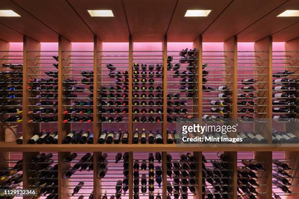 upscale wine rack - wine room stock-fotos und bilder
