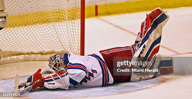 New York Rangers' goalie Henrik Lundqvist goes flat to stop a third period shot by Florida Panthers Stephen Weiss at the Bank Atlantic Center in...