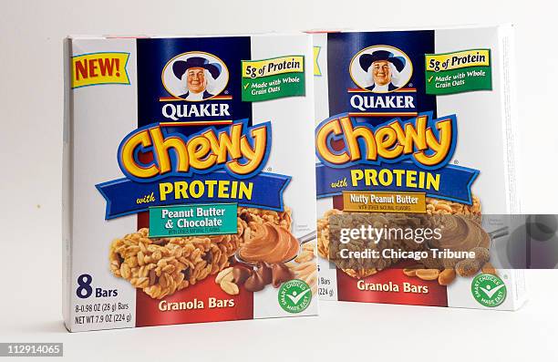 Two boxes of Quarker's Chewy Granola Bars.