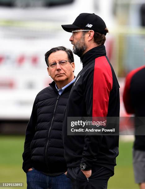 Jurgen Klopp manager of Liverpool talking with Tom Werner part owner of Liverpool Football Club during a training session on February 12, 2019 in...