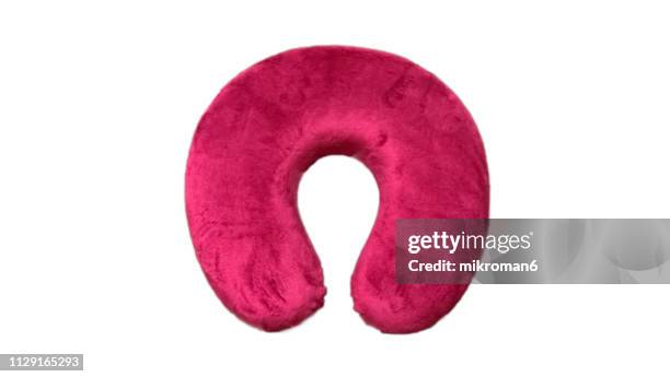 pink u-shaped memory foam travel neck pillow - neck pillow stock pictures, royalty-free photos & images