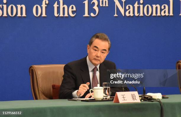 Chinese Foreign Minister Wang Yi holds a press conference on international and regional issues within the annual meetings of the National People's...