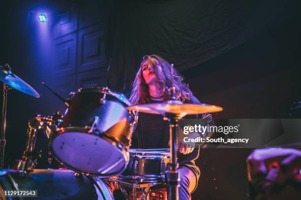 woman drummer - drummer stock pictures, royalty-free photos & images