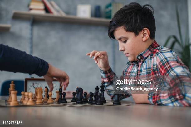 kids playing chess - chess timer stock pictures, royalty-free photos & images