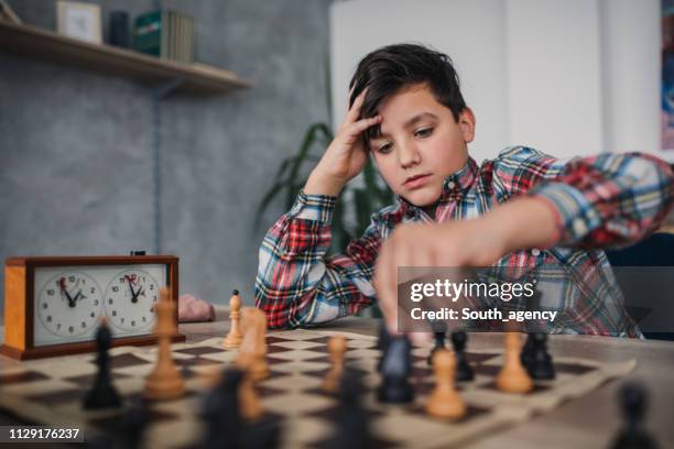 kids playing chess - king chess piece stock pictures, royalty-free photos & images