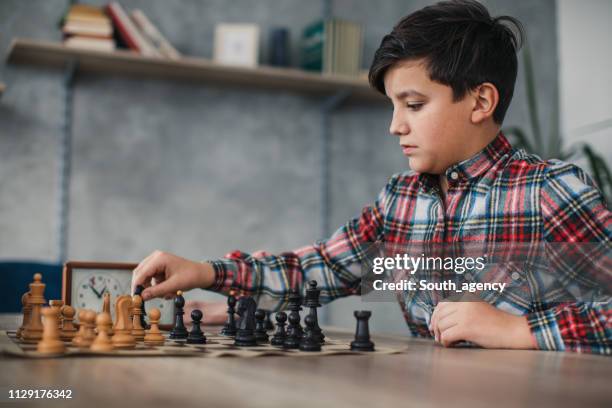 boys playing chess - chess timer stock pictures, royalty-free photos & images