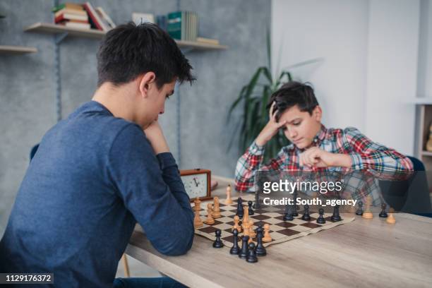 kids playing chess - chess timer stock pictures, royalty-free photos & images