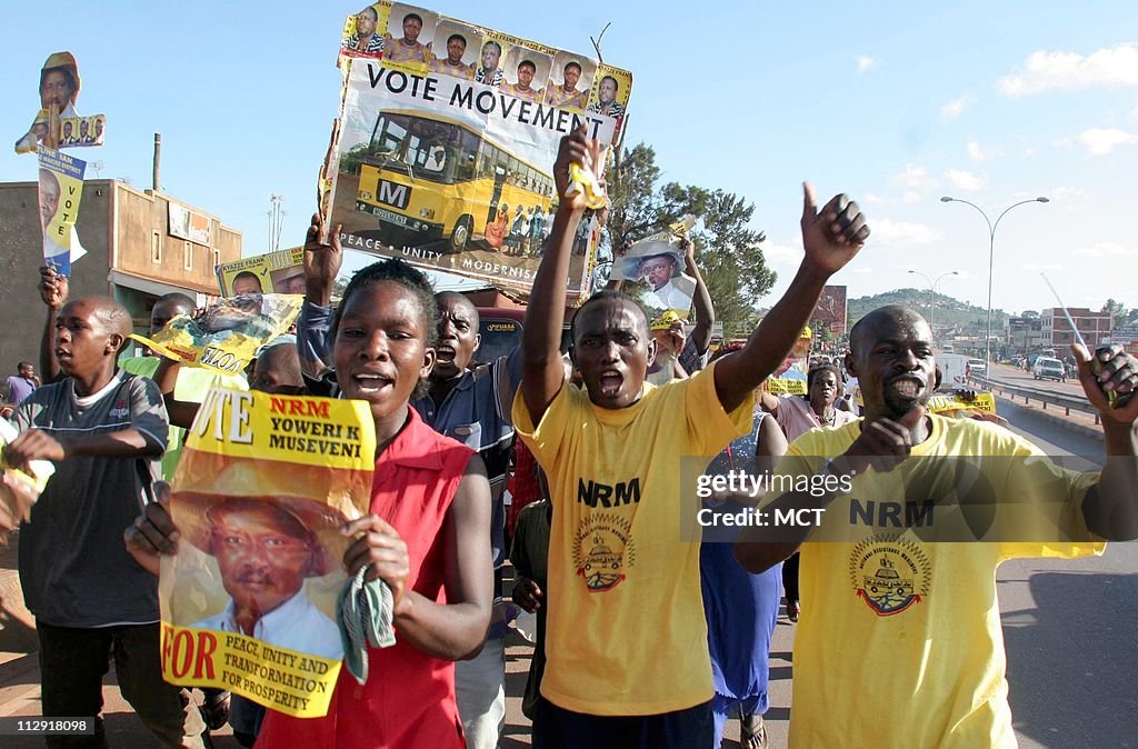 Supporters of Ugandan President Yoweri Museveni celebrate hi