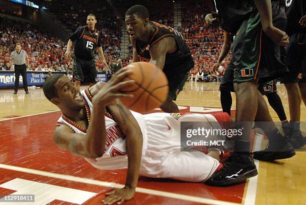 Maryland's Travis Garrison dives to save the ball against Miami in the second half of the Terrapins' 65-61 victory at the Comcast Center in College...