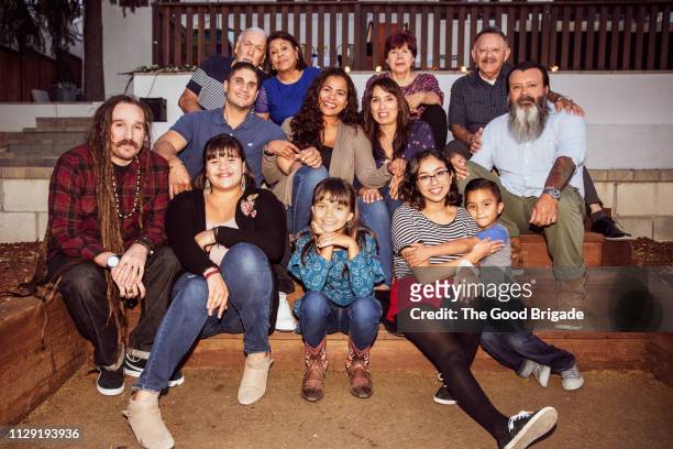 smiling multi-generation family portrait - family portrait imagens e fotografias de stock