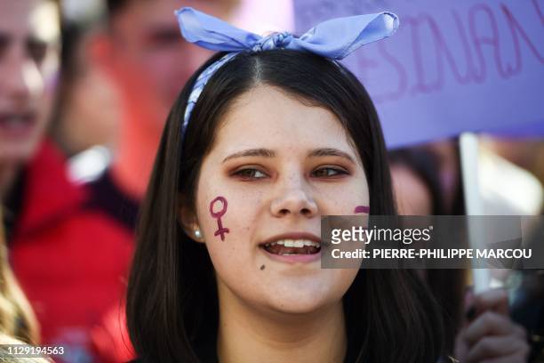 Protester shouts slogans during a demonstration marking International Women's Day in Madrid on March 8, 2019. - For the second year running, Spanish...