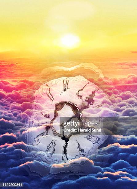 distorted appearing vintage antique grandfather clock face with roman numeral numbers and hour and second hands floating in a sea of sun lit clouds. - roman numeral 4 stock pictures, royalty-free photos & images