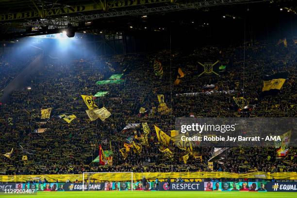 Fans of Borussia Dortmund in the yellow wall during the UEFA Champions League Round of 16 Second Leg match between Borussia Dortmund and Tottenham...