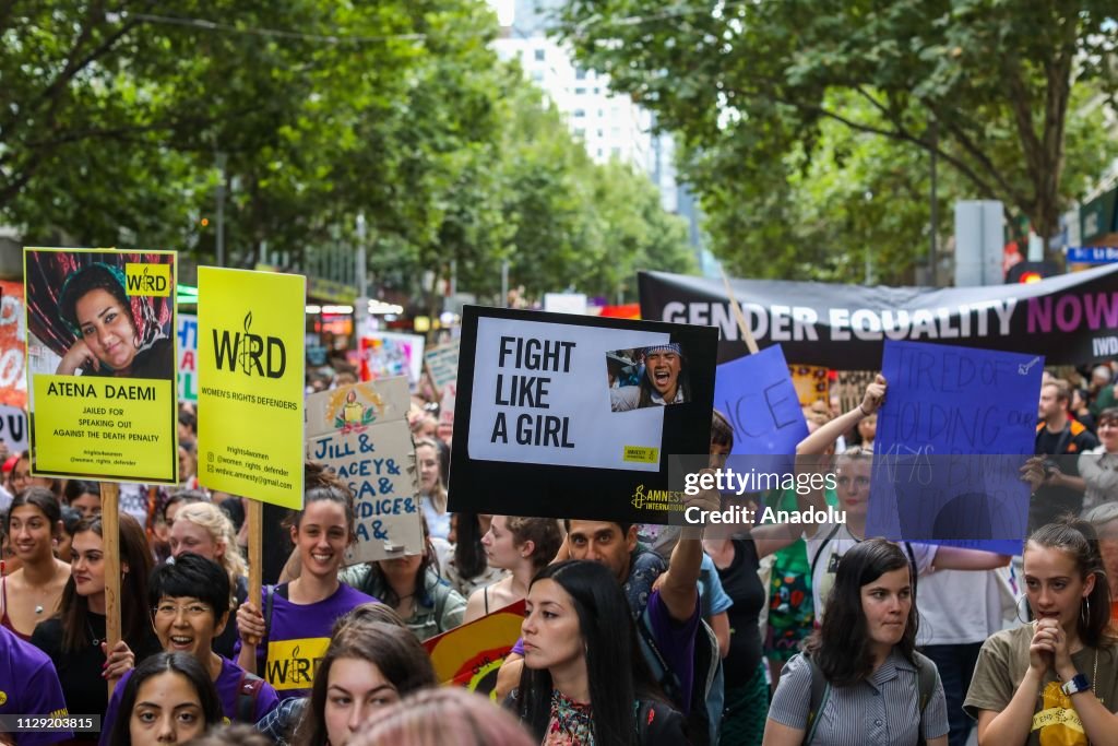 Woman Rally Event Protestors hold placards during a rally on International Women's Day ...
