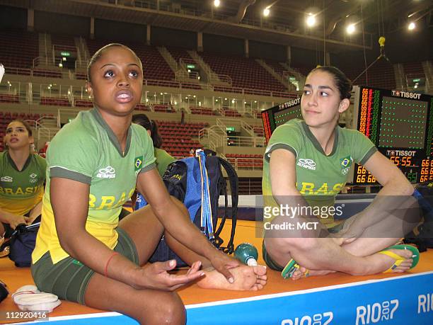 Brazilian gymnasts Daiane dos Santos and Lais Souza train July 4 at the new 15,000-seat arena where they'll compete in the Pan American Games, which...