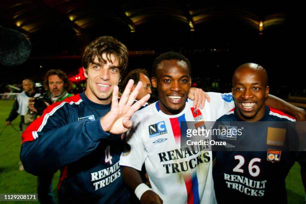 Michael ESSIEN, Sidney GOVOU of Lyon celebrates his victory for the championship title during the Ligue 1 match between Lyon and Ajaccio at Gerland...