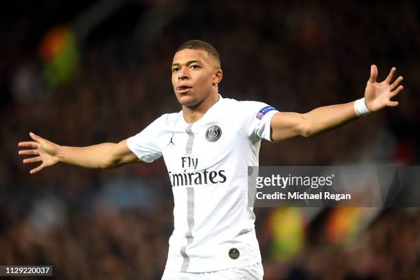 Kylian Mbappe of PSG celebrates after scoring his sides second goal during the UEFA Champions League Round of 16 First Leg match between Manchester...