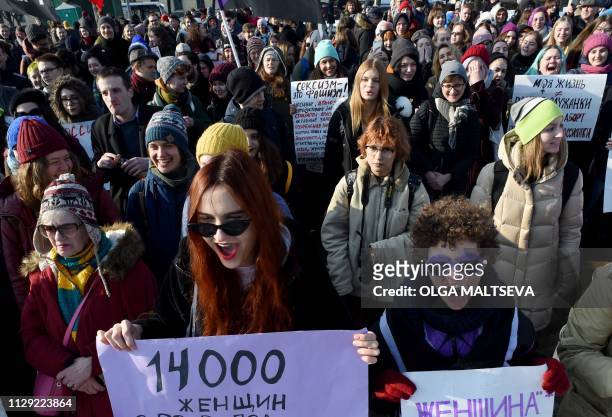 Feminist activists take part in a rally for gender equality and women's rights in Saint Petersburg, on March 8 as International Women's Day is being...
